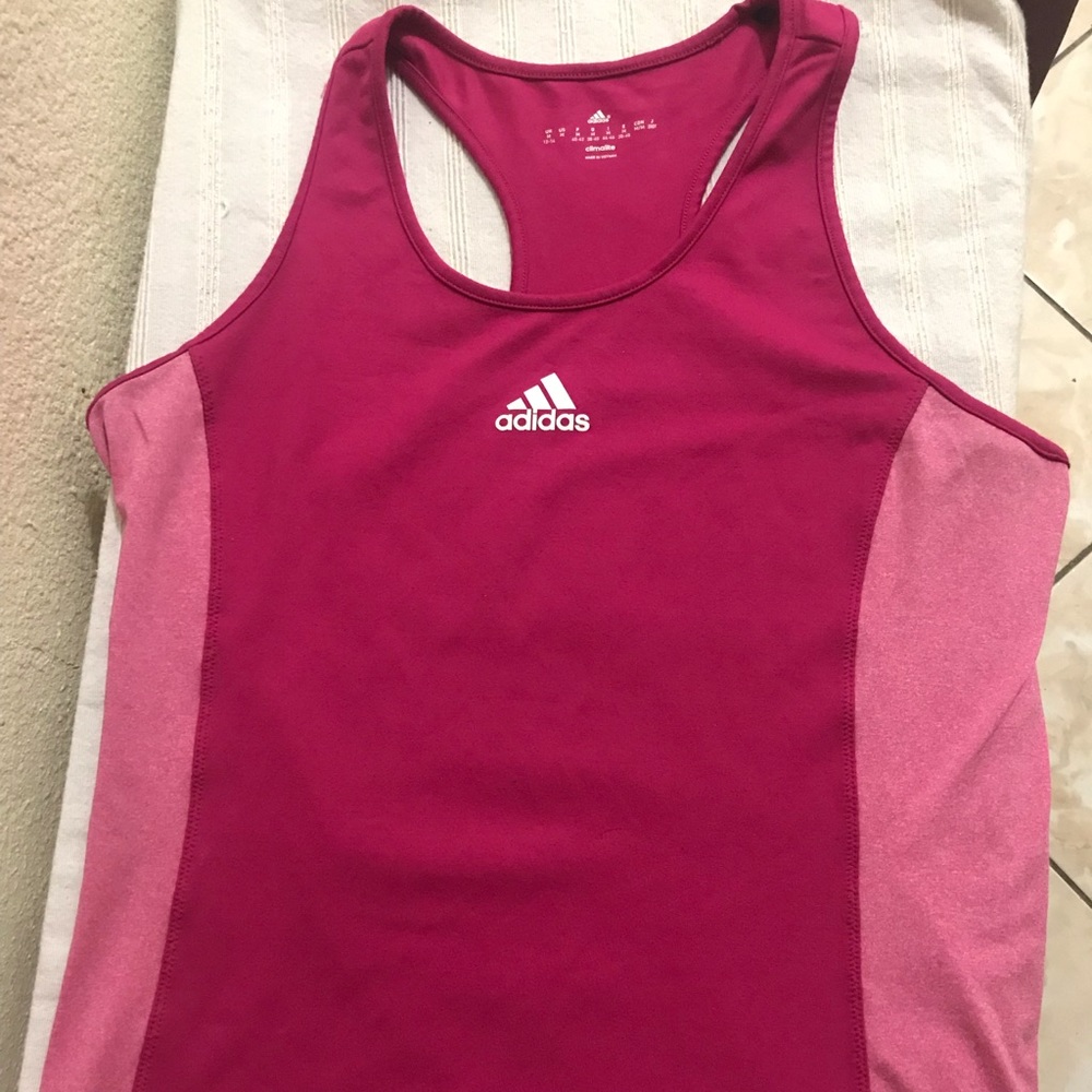 Adidas razor back tank top size medium.